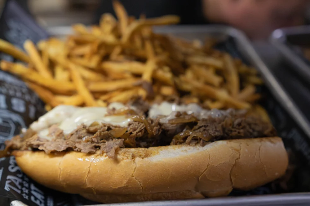 CJ’s steak and melted Swiss sandwich on a grilled sub bun