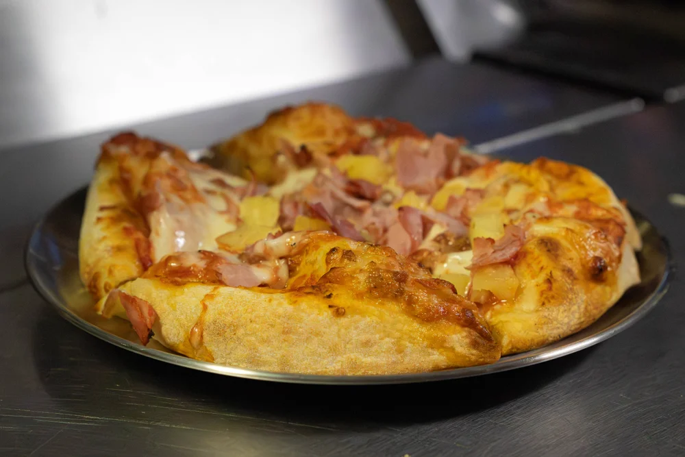 CJ’s personal pizza topped with ham and pineapple