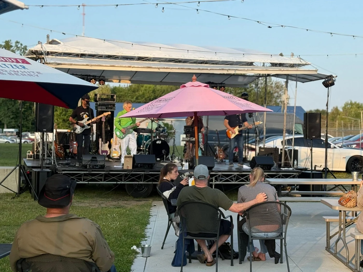 Guests enjoying a past live music afternoon outside at CJ’s